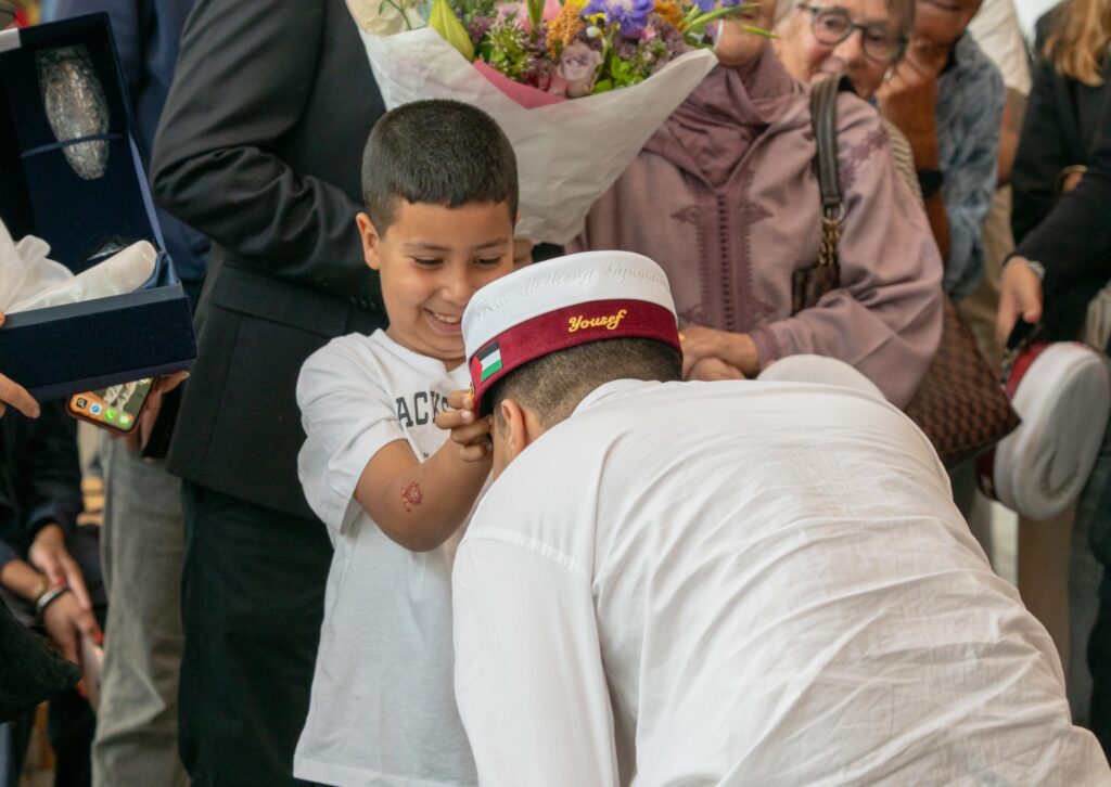He was almost treated like a celebrity when he got his graduation cap on.